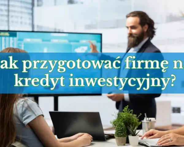 Biznesmeni omawiają, jak przygotować firmę na kredyt inwestycyjny. Na ekranie wykresy.