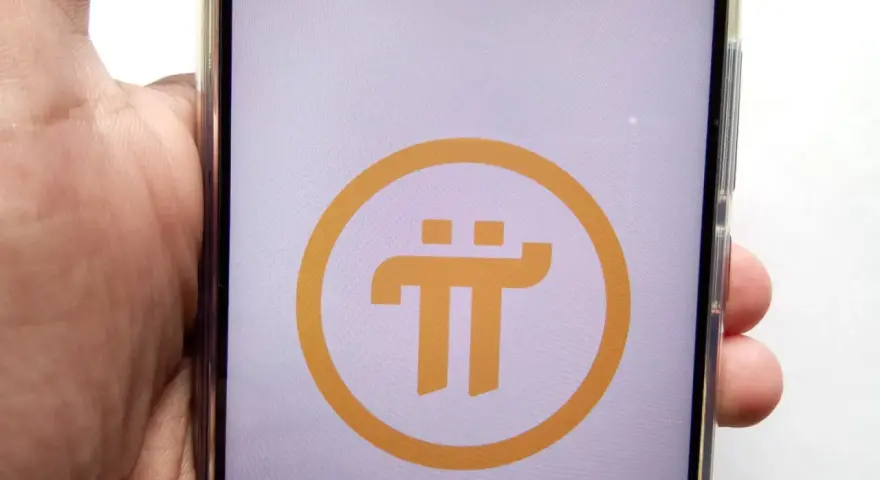 Telefon z logo Pi Network, symbolizującym nadzieję na szybkie pi network kiedy na giełdzie.