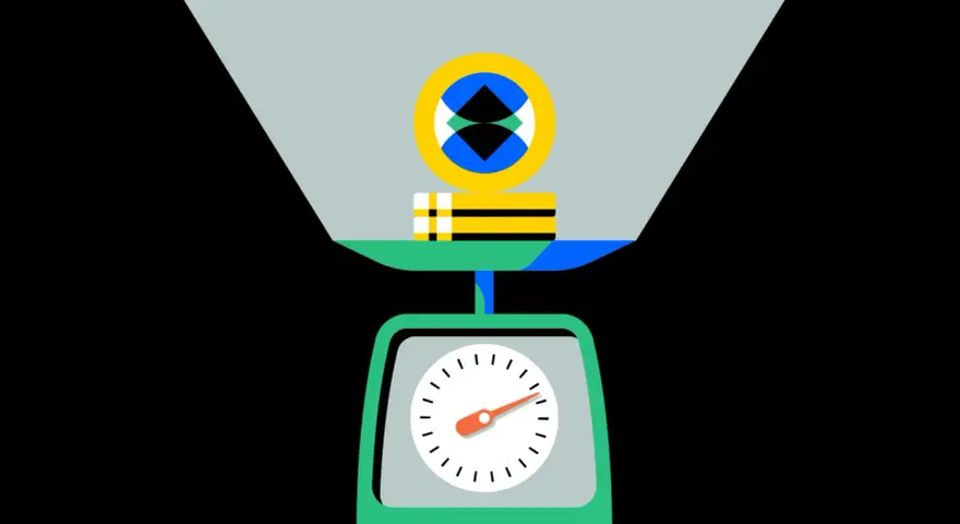 Waga pokazuje, jak ważny jest market cap. Na szalkach leżą kolorowe prostokąty i symbol przypominający monetę.